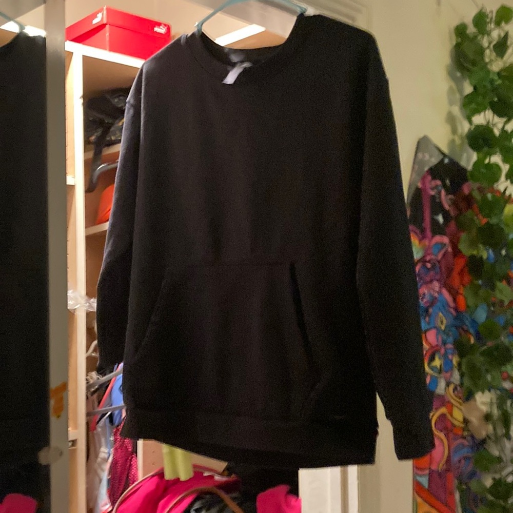 This is a black sweater with pockets and no hoodie